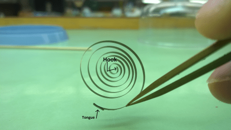 Note-this spring is an older spring and is considered "set" which is why it doesn't have the reverse curve. 