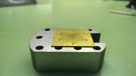 Plate with holes deburred